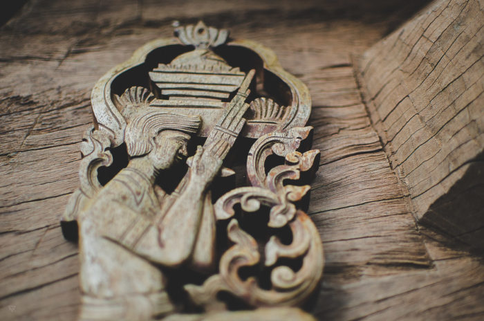 wood scultpure in Laos taken by Milie Del