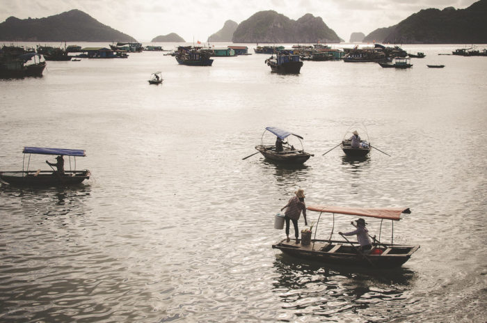 Stunning sunset on the fishing boats in Cat ba island Vietnam taken by Milie Del