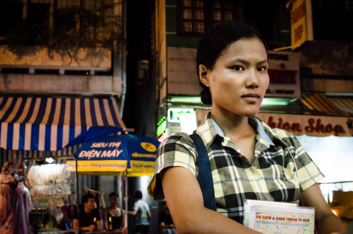 portrait of a woman in old town Ho Chi Minh City Vietnam taken by Milie Del