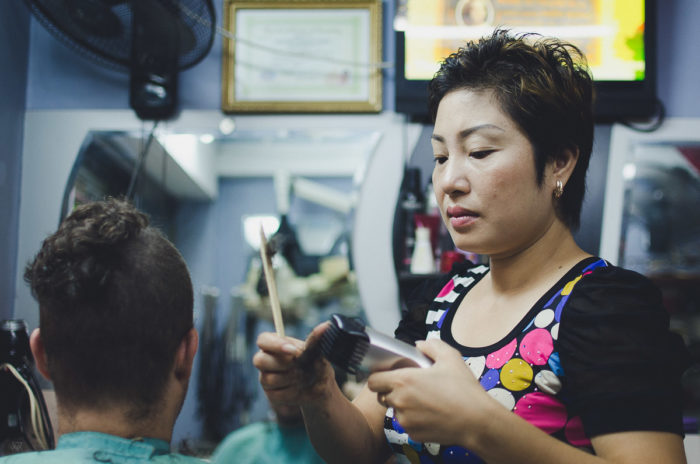 getting his hair done in Hai Phong city Vietnam taken by Milie Del
