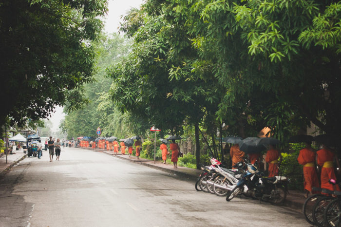 Early Morning Alms Giving to the Monks in Luang Prabang in Laos taken by Milie Del
