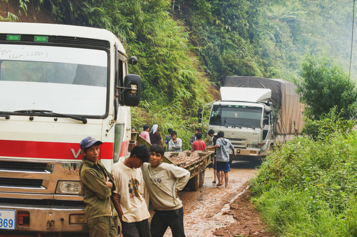 trunk conductors waiting for a clear road to Luang prabang in Laos taken by Milie Del