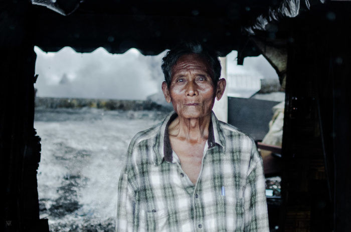 Portrait of an Old man in a salt factory near Vientiane Laos taken by Milie Del