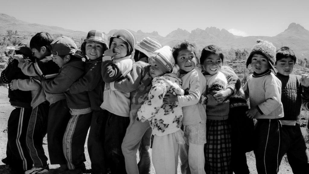 Black and white portraits of Children at school in the amaru community village in Peru taken by Milie Del