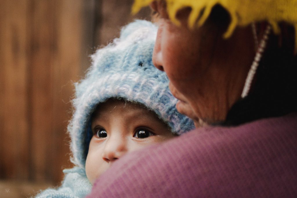 Baby and her mother in the amary community in Peru taken by Milie Del