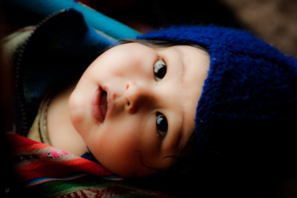 Baby portrait in the amary community in Peru taken by Milie Del