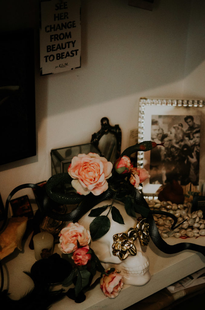 Roses frame skull apartment before editorial shoot