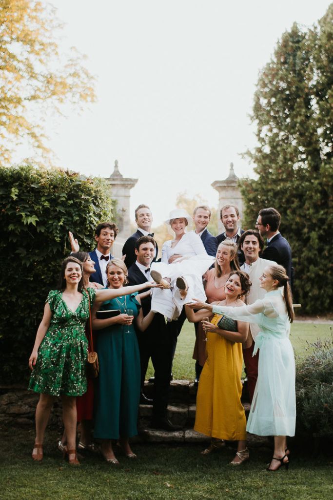 Bestmen and groom Wedding boho reception under the fig trees 