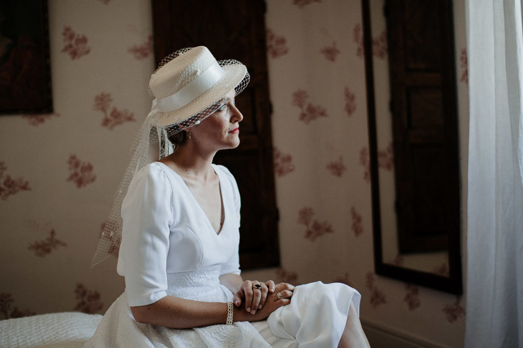 bride looking at the window soft light