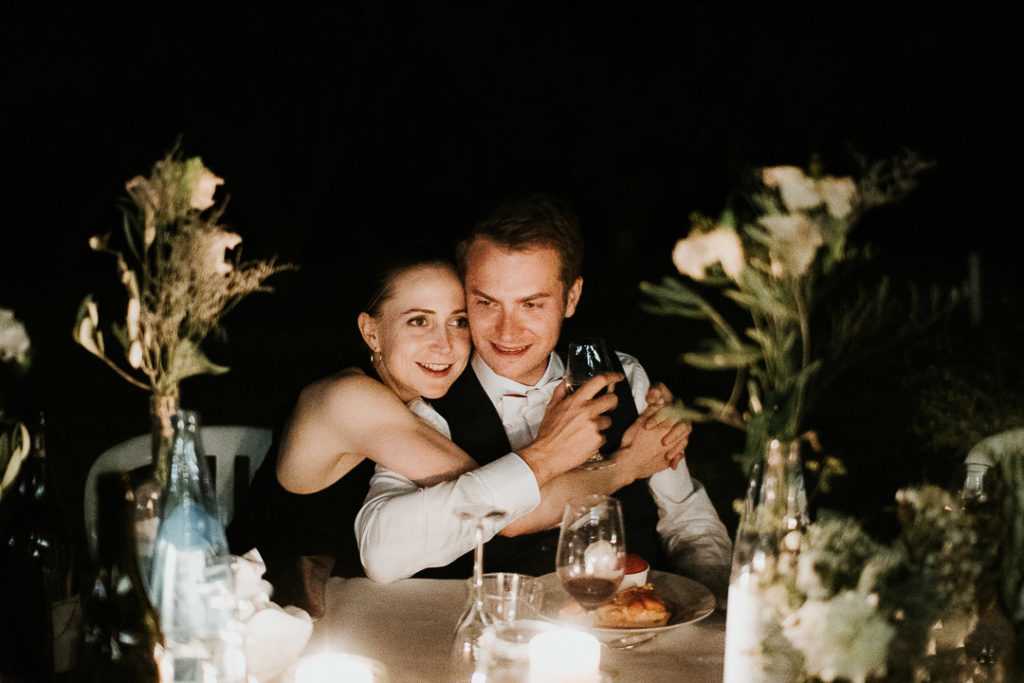 Best friend and groom at dinner