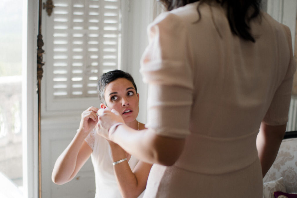 bride and maid of honor bridal prep modern wedding