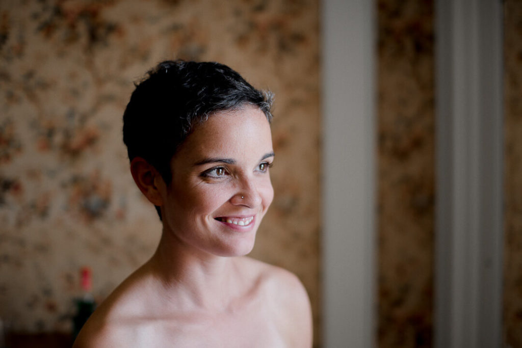 naked bride smilling prep modern wedding