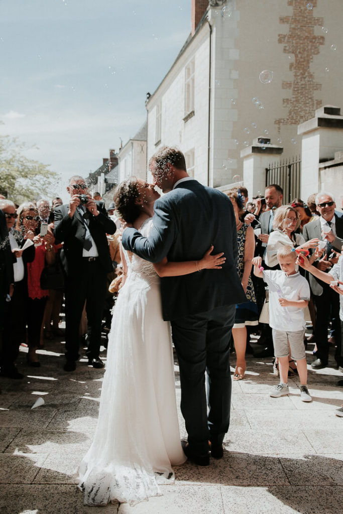 couple kissing newly wed in touraine france
