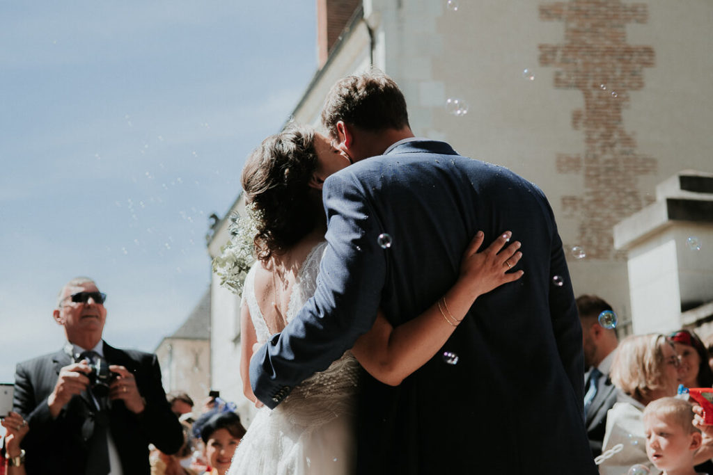 couple kissing newly wed in touraine france