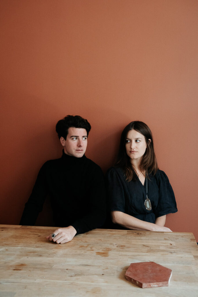 portrait couple terracotta walls milie del