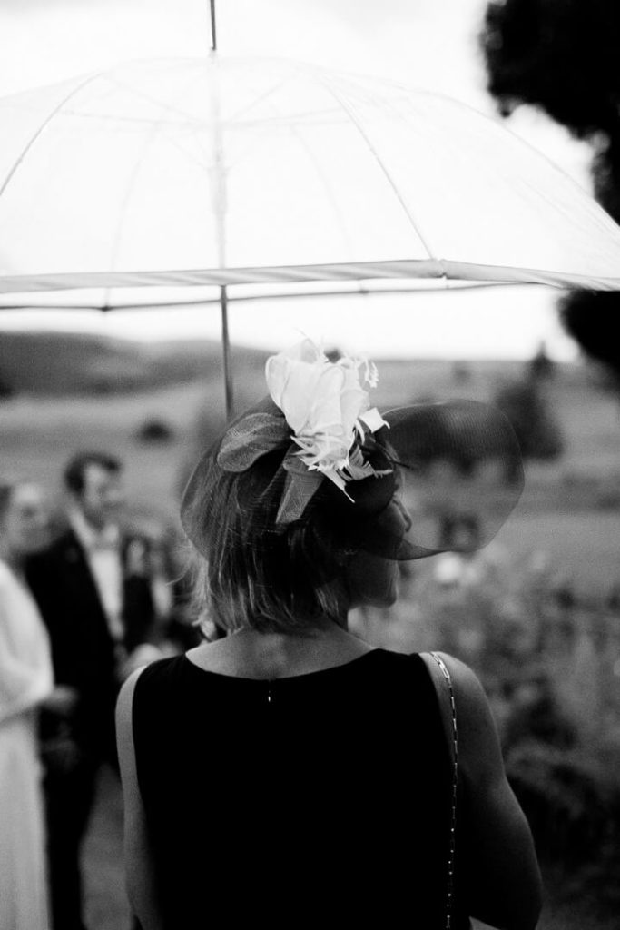 rainy wedding day umbrella milie del