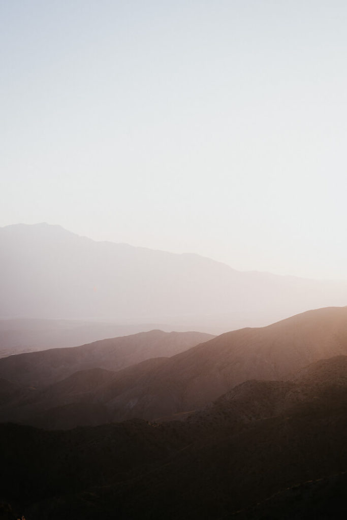 sunset over the mountains of joshua tree