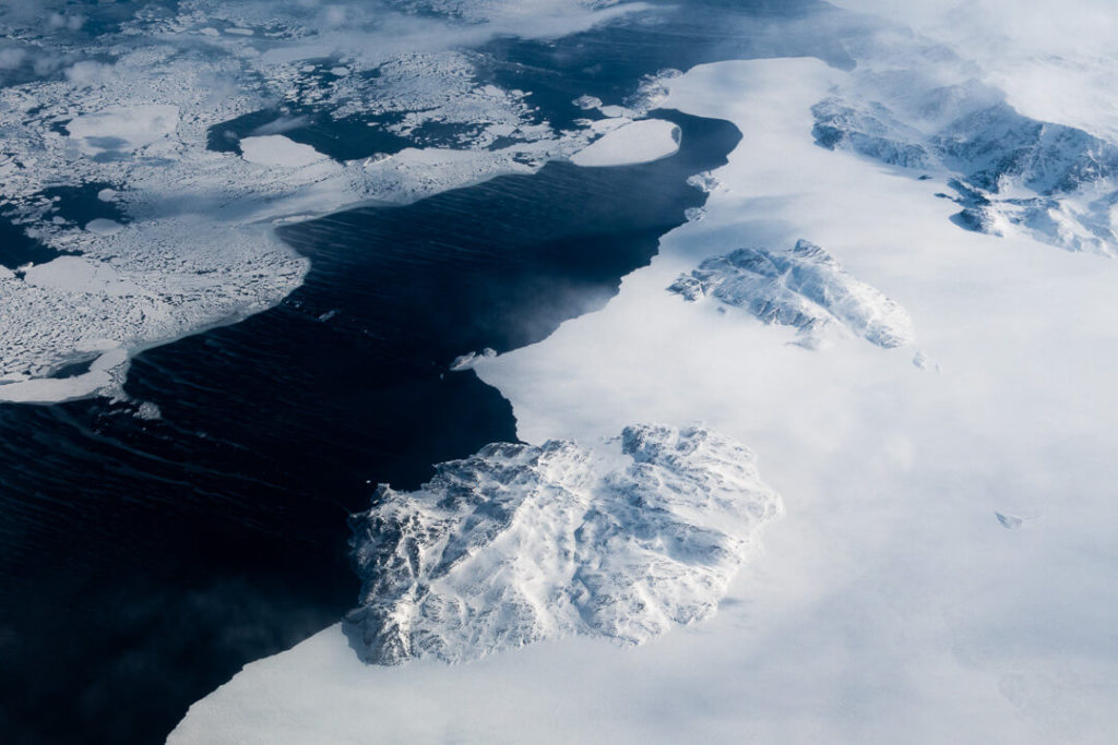 Atlantic ocean sea of ice canada from a plane