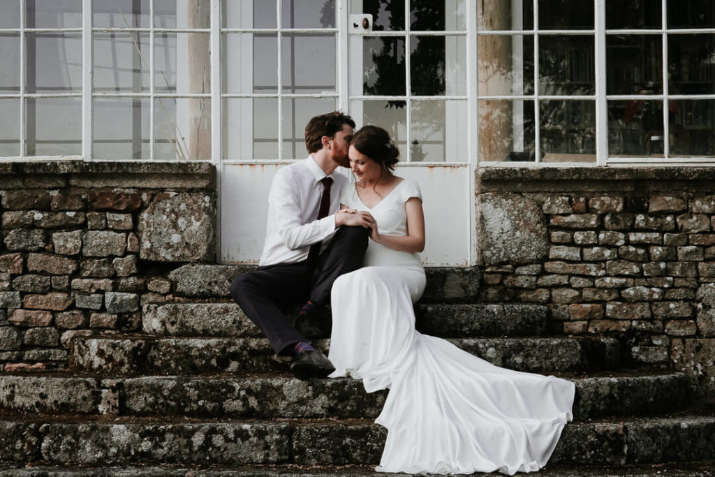 french australian couple posing greenhouse