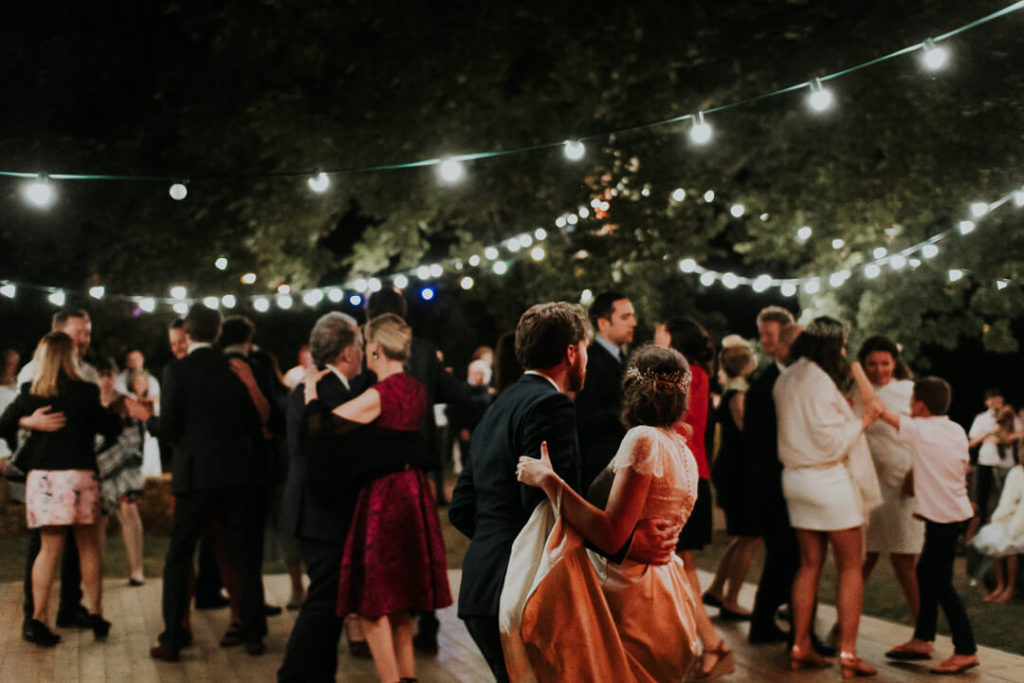dancing at night during wedding festivities