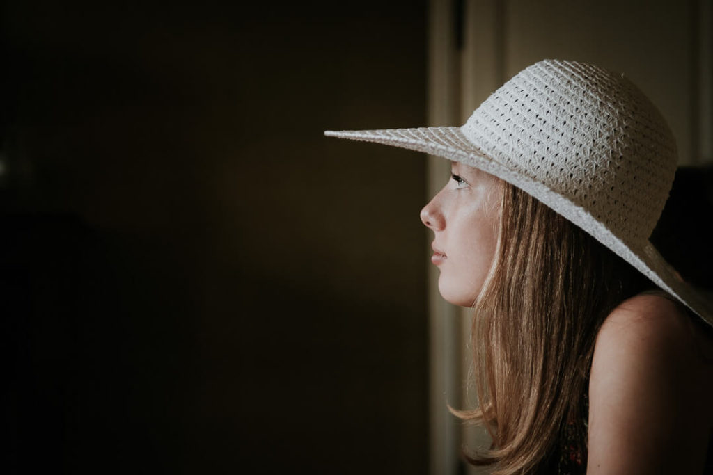 portrait of a girl with a hat wedding day
