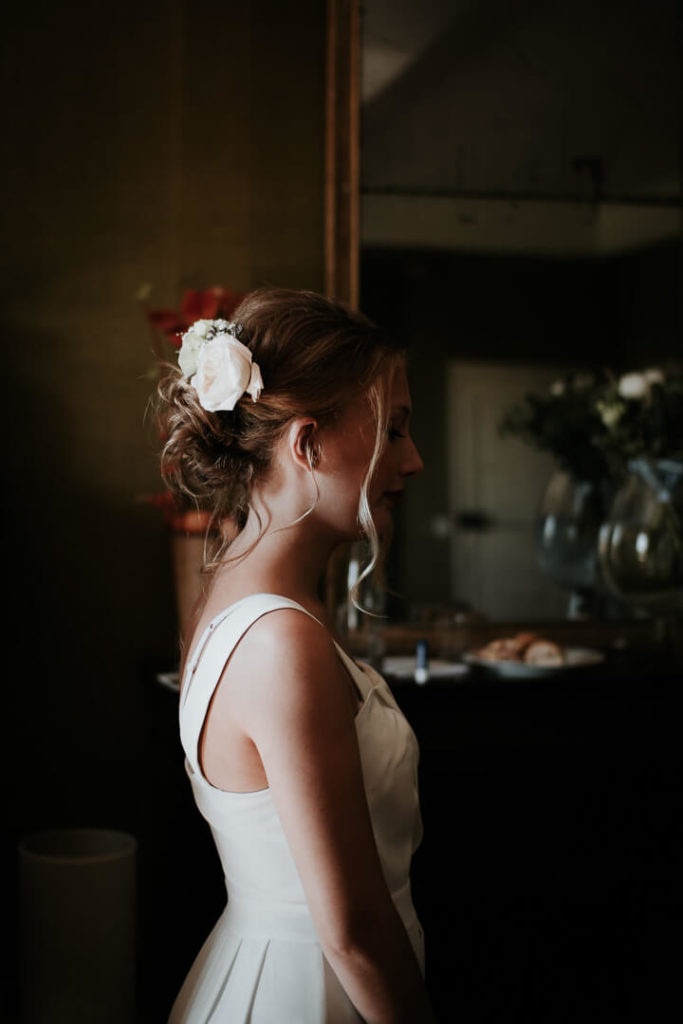 flower in the hair white dress poetic wedding photography
