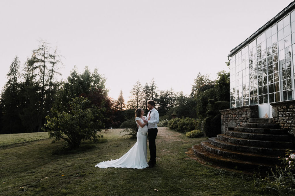 french australian wedding couple at sunset greenhouse