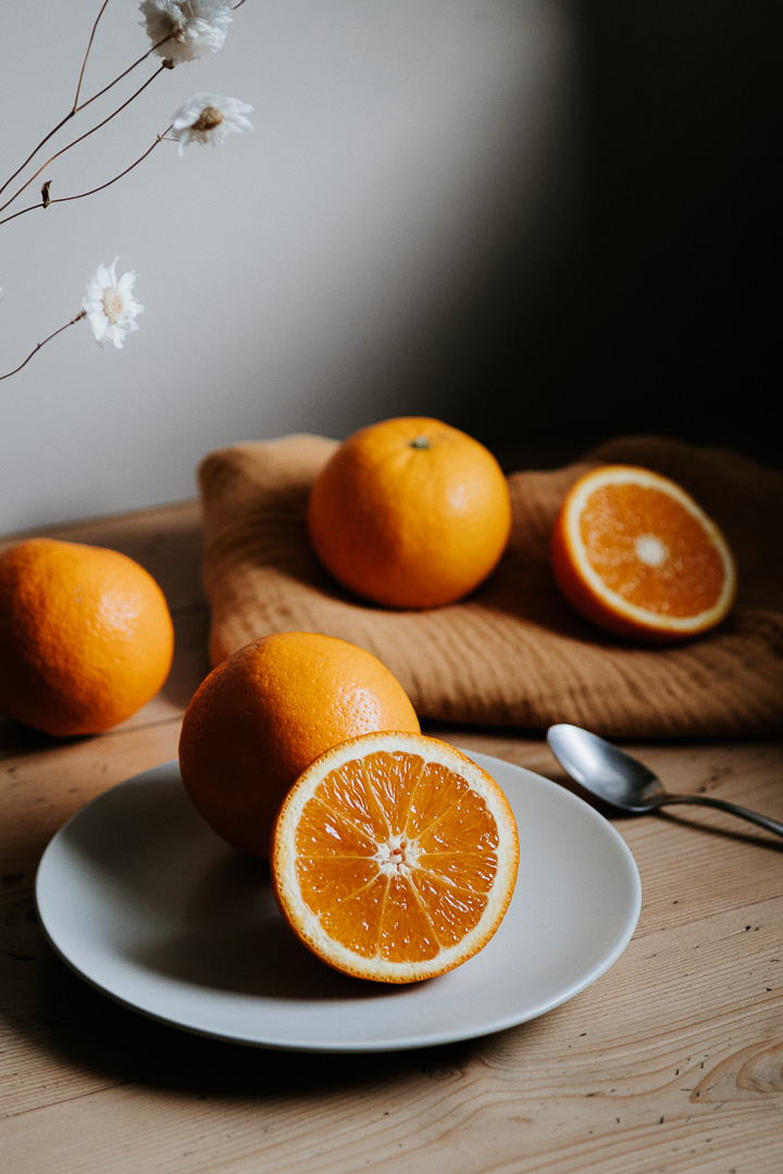 oranges on a vintage table food photography miliedel
