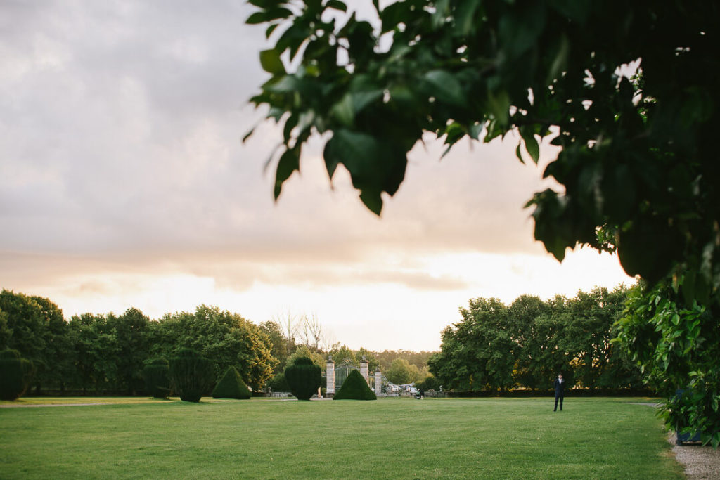 Fairy tale wedding day groom Luxury wedding photographer Château de Sully Milie Del