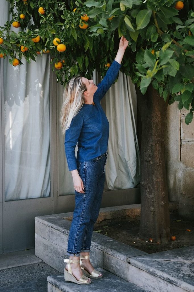 Reaching for oranges in Espadrilles