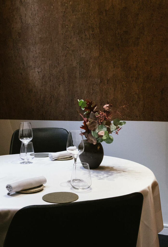 Interior design and tables at Reflet d'Obione one star guide Michelin in Montpellier by food photographer Milie Del