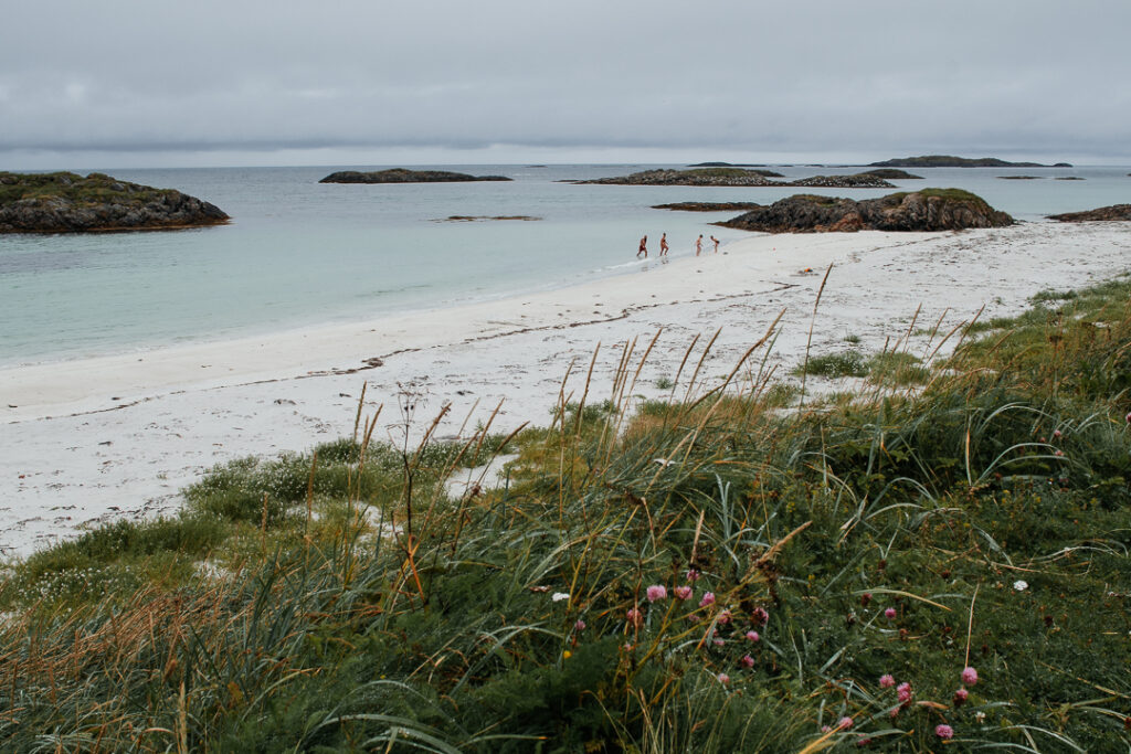Swimmers by the beach in Andenes