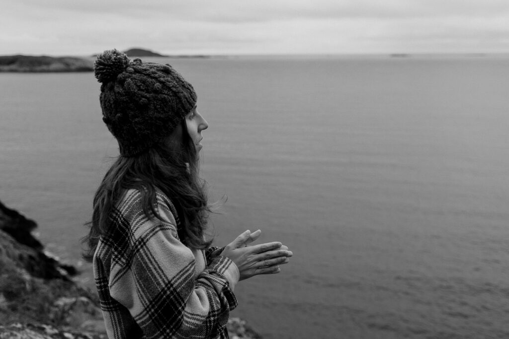 Lisa standing on a cliff