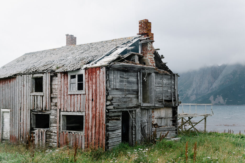 abandoned house by the fjord